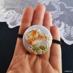 vintage-haarband-taschentuch-windjana-orange-flowers-1.jpg Vintage-Haarband Orange Flowers